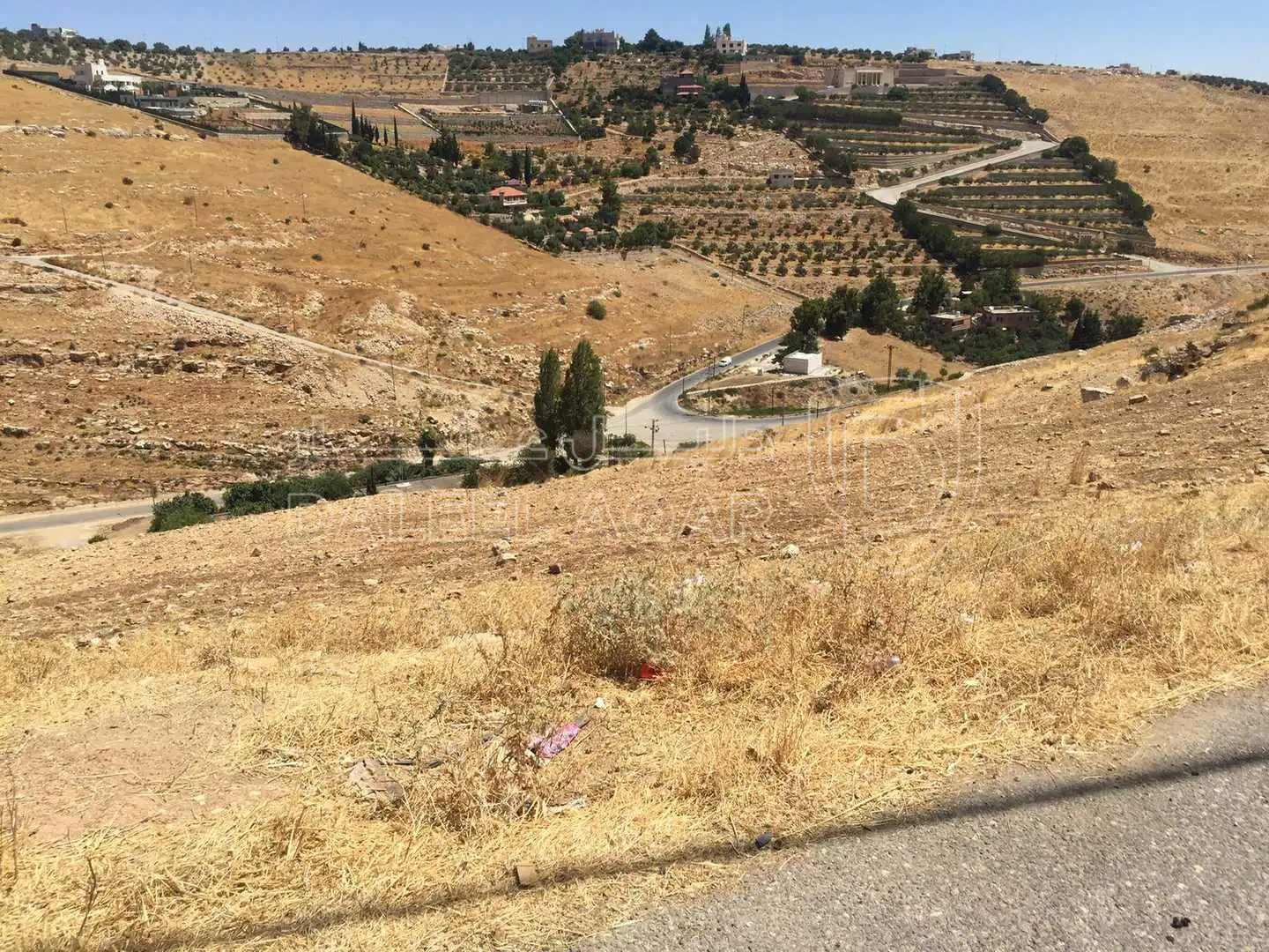 أرض في طريق السرو مثلث اليزيديه ‎ثاني دخله عالشمال - 100,000 دأ - صورة 1